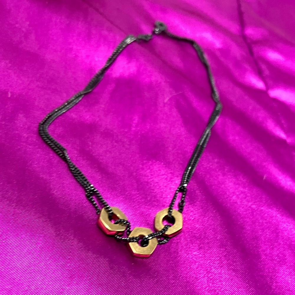 Marc Jacobs gunmetal and gold plated screw necklace.